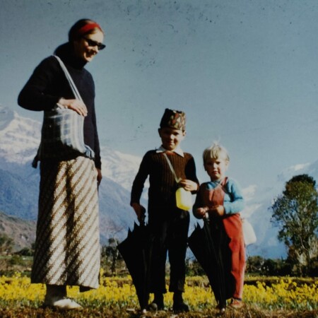 Mother and two children in front of Machapuchare, Nepal