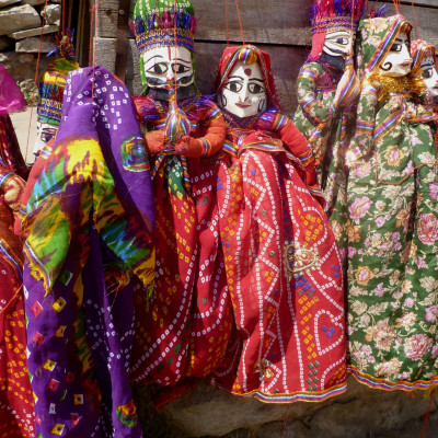 A row of Indian puppets