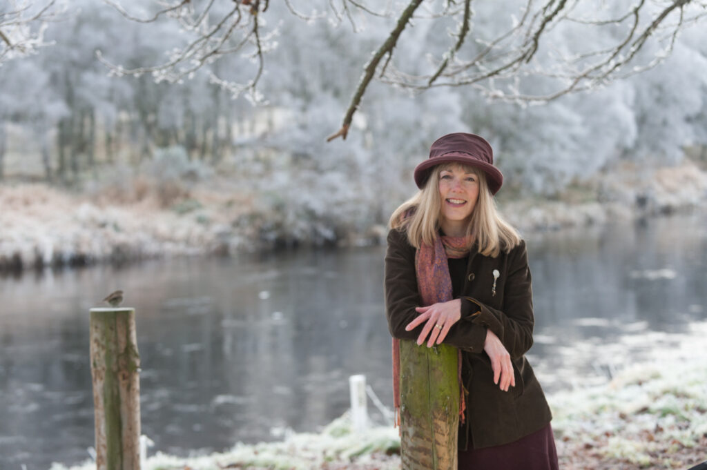 Merryn Glover with Robin by River Spey -Credit: Stewart Grant